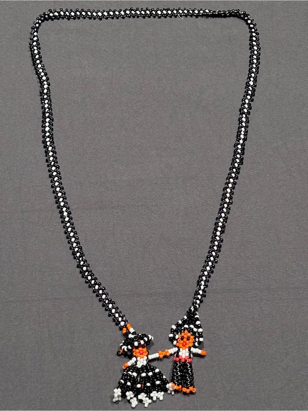 Vintage Handmade Native American Seed Beaded Doll Necklace
